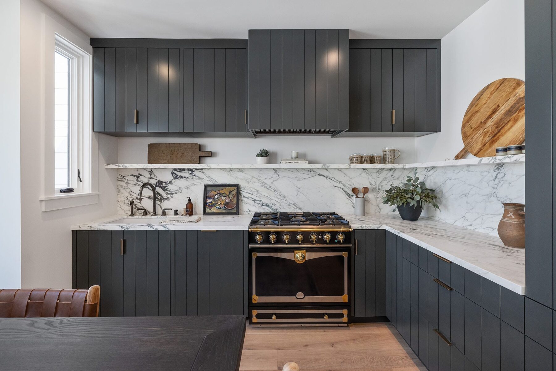 "What colors go best in kitchens with black appliances?" Open Homes