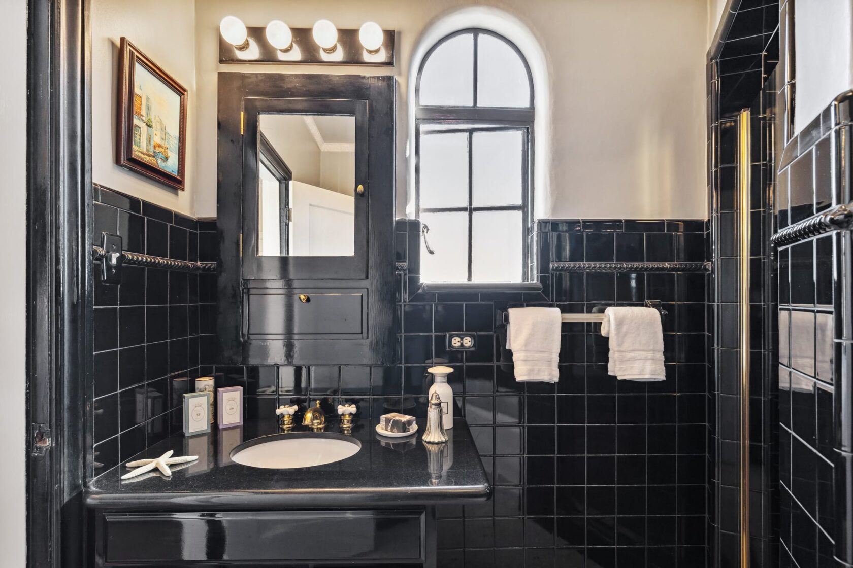 black vanity and black bathroom