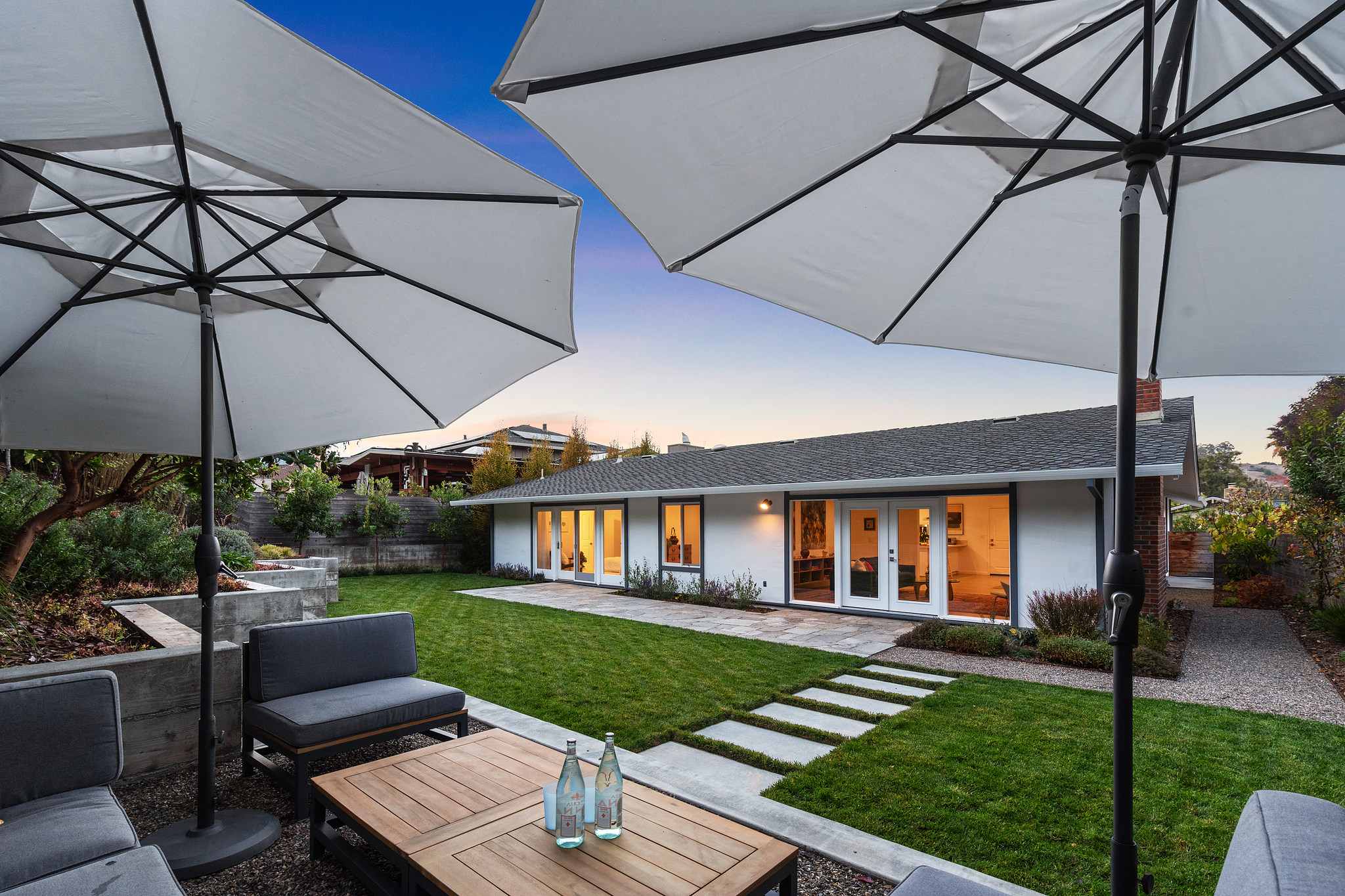 Twilight Back Yard With Umbrellas